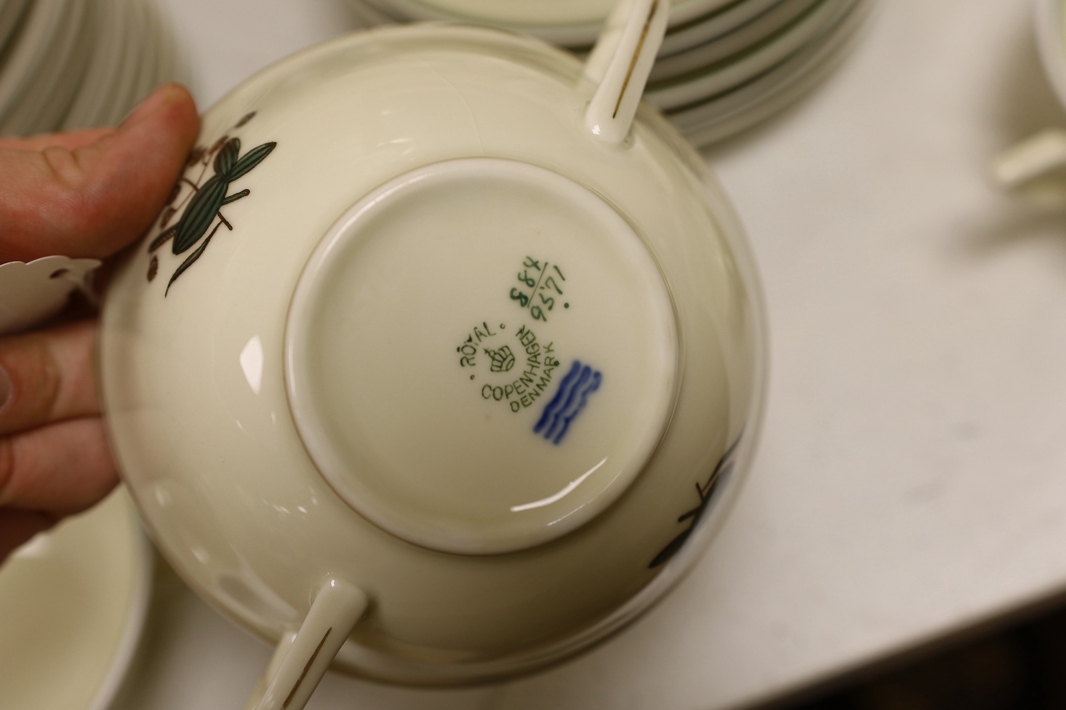 A Royal Copenhagen 'Quaking Grass' pattern part dinner service amd six Beswick circus bowls